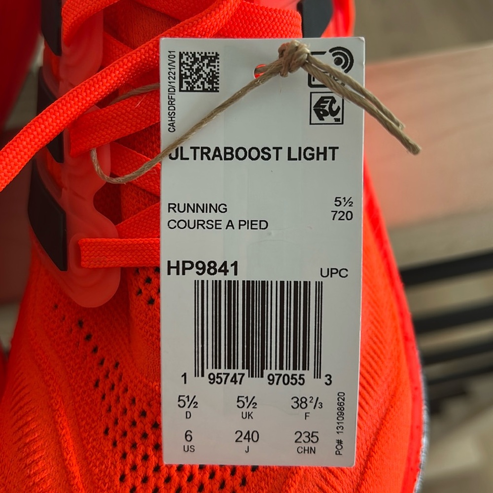 Brand new with tags adidas ultraboost light in fluorescent